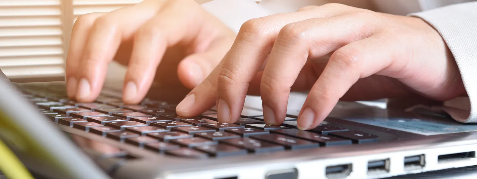 An employee entering data.
