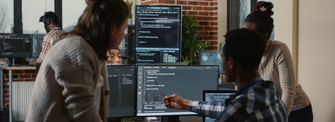 Team of software developers collaborating on innovative solutions at LoudlyDev